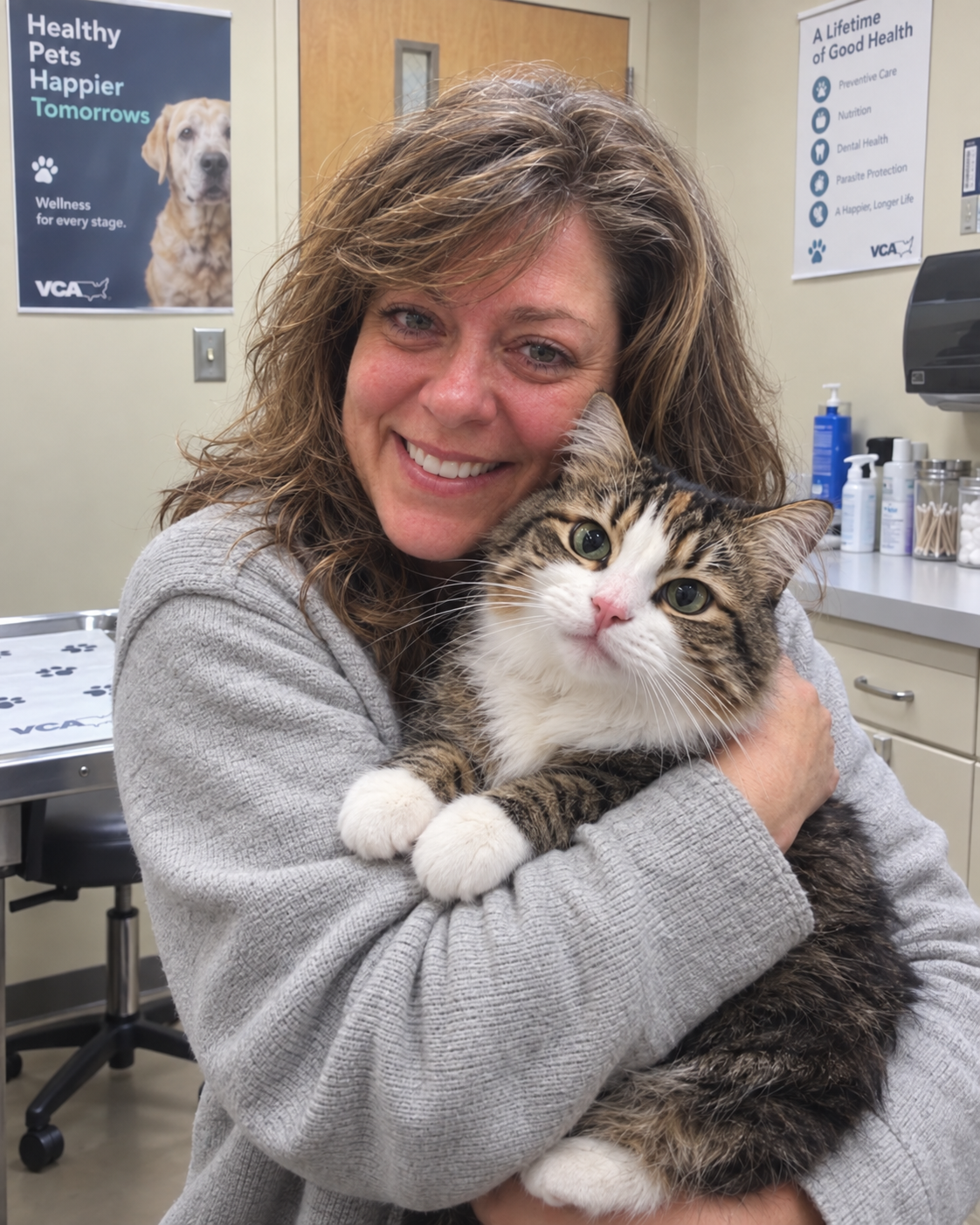 Person holding a cat